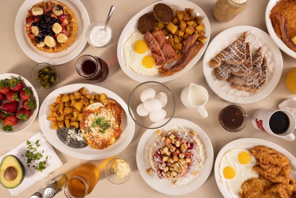 A table spread of Hungry Jack's breakfast favorites in Crosby, TX — the meal a Hungry Jack's gift card buys