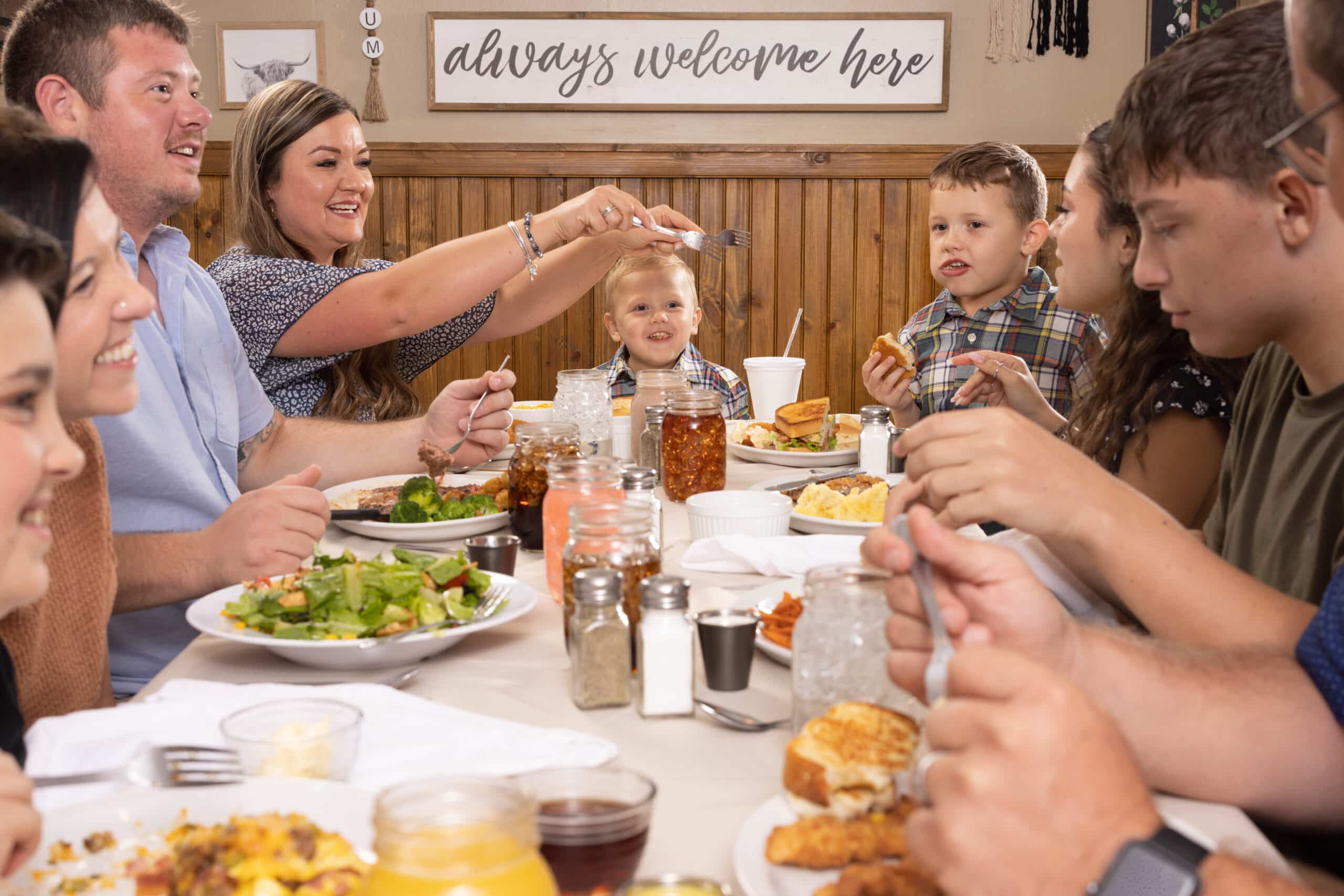 A family enjoying breakfast together at Hungry Jack's Restaurant, the best breakfast spot in Houston.