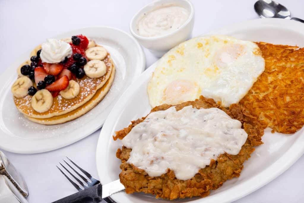 Country Fried Steak and eggs at Hungry Jack's in Crosby TX — hand-breaded steak served with savory country gravy and two eggs, the best country fried steak in Houston, TX.